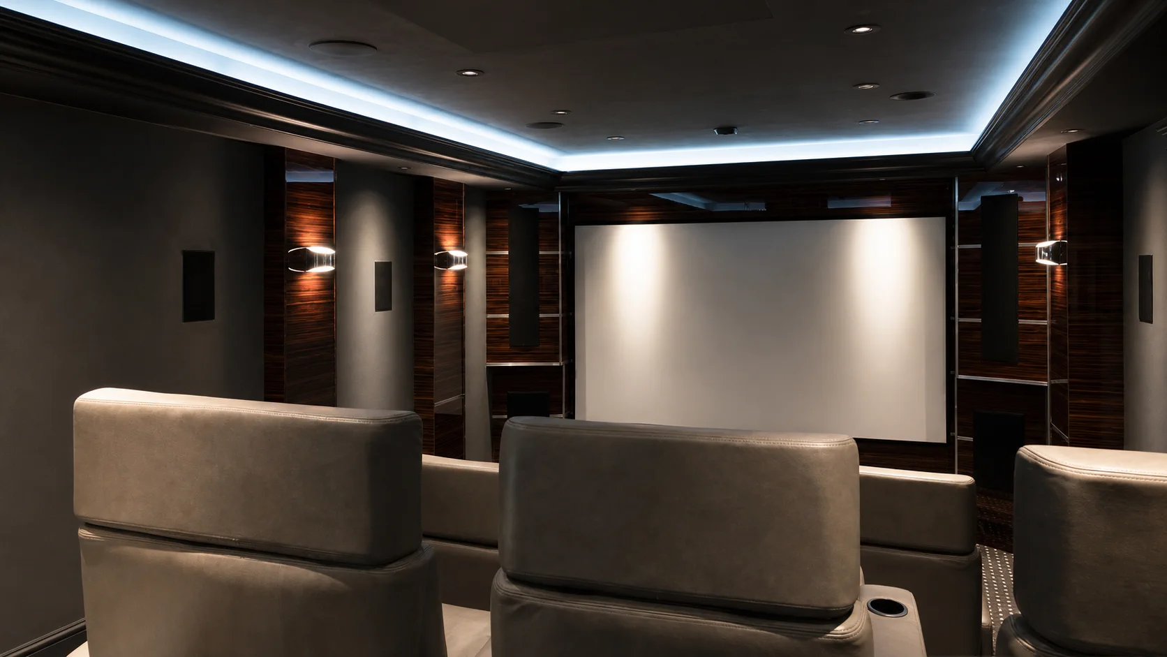ProSound-style dedicated theater with in-wall surrounds and dark in-ceiling speakers