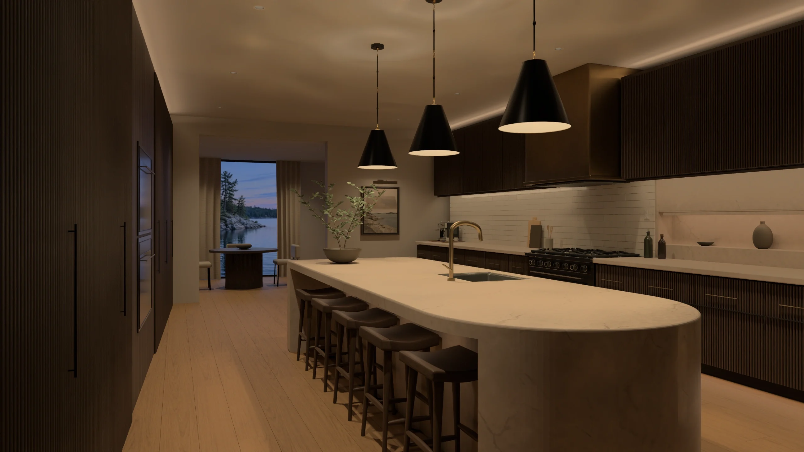 A sculptural stone island, oak cabinetry, and warm lighting at blue hour